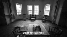 One photographic subject: a black-and-white room with a piano, rocking chairs, and a chess table.